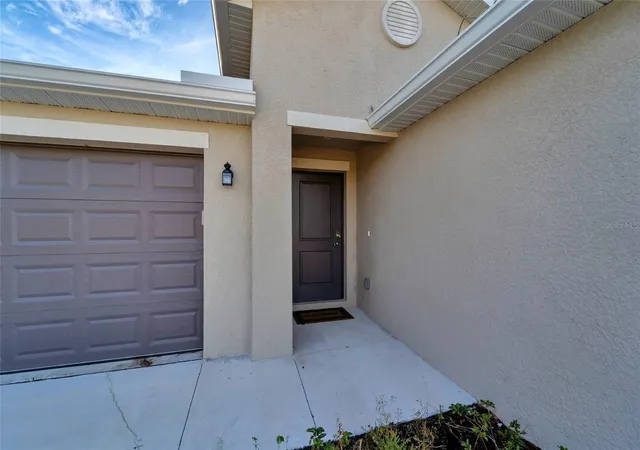 Photo 2 of Single family home for sale at 1207 Sheehan Blvd, Port Charlotte, FL 33952 | MLS# A4701808 | Listing updated on 2026-08-21