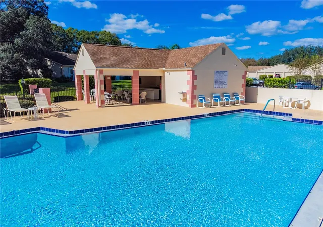 Listing Photo 2 - Condo for sale in building located at 11512 Versailles Ln, PORT RICHEY, FL 34668 - Unit #11512