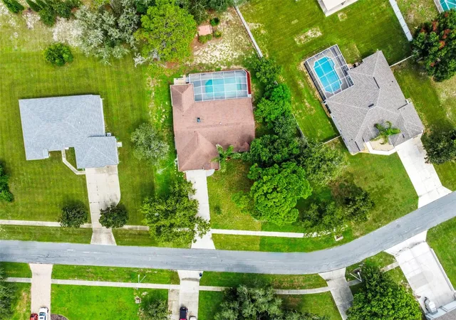 Photo 3 of Single family home for sale at 132 Gillian Dr, Spring Hill, FL 34609 | MLS# W7888194 | Listing updated on 2026-09-13