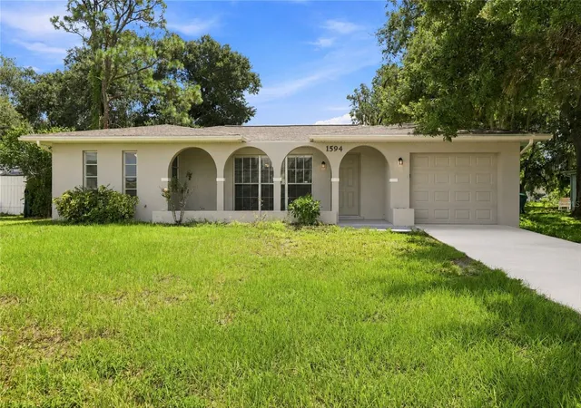 Photo 1 of Single family home for sale at 1594 Beacon Dr, Port Charlotte, FL 33952 | MLS# C7529098 | Listing updated on 2026-09-30