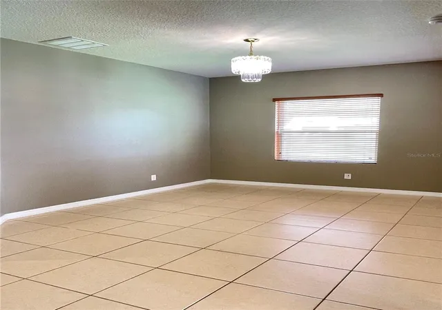 Photo 3 of Single family home for sale at 12810 Boggy View Dr, Orlando, FL 32824 | MLS# O6430056 | Listing updated on 2026-09-15