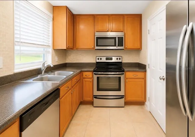 Photo 4 of Condo for sale at 4312 Hector Ct #4, Orlando, FL 32822 | MLS# O6430065 | Listing updated on 2026-09-18