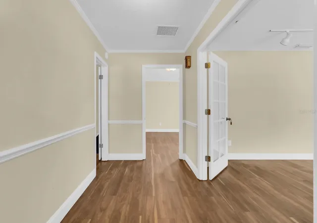 Photo 3 of Single family home for sale at 215 Palmetto Concourse, Longwood, FL 32779 | MLS# O6430131 | Listing updated on 2026-09-26