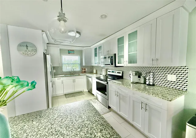 Photo 4 of Single family home for sale at 1237 Lotus Path, Clearwater, FL 33756 | MLS# TB8535190 | Listing updated on 2026-09-22