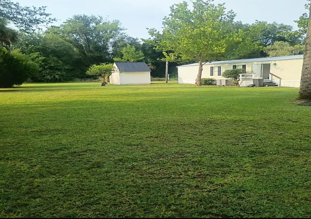 Photo 2 of Manufactured home for sale at 105 Canary Ln, Satsuma, FL 32189 | MLS# S5154876 | Listing updated on 2026-08-31