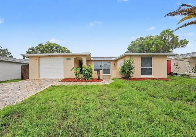 Photo 1 of Single family home for sale at 9135 Hunt Clb Ln, Port Richey, FL 34668 | MLS# O6430191 | Listing updated on 2026-09-28