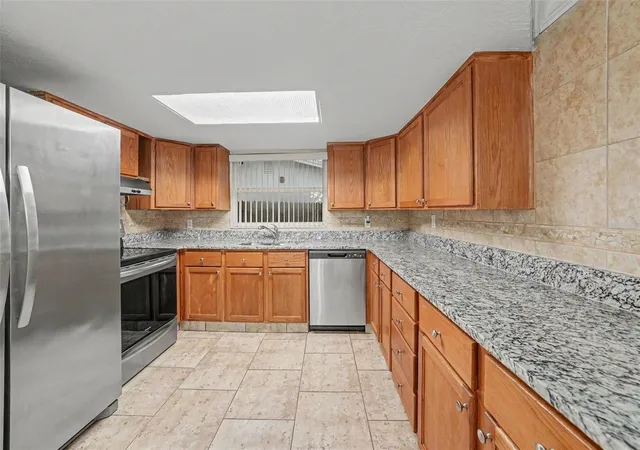 Photo 3 of Single family home for sale at 9135 Hunt Clb Ln, Port Richey, FL 34668 | MLS# O6430191 | Listing updated on 2026-09-28