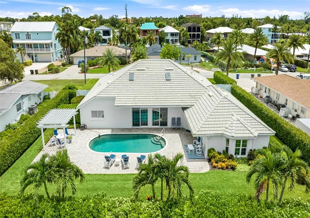 Photo 2 of Single family home for sale at 7780 Holiday Dr N, Sarasota, FL 34231 | MLS# A4701902 | Listing updated on 2026-10-29