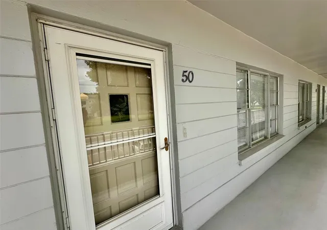Photo 2 of Condo for sale at 2100 World Pkwy Blvd #50, Clearwater, FL 33763 | MLS# TB8535323 | Listing updated on 2026-09-23