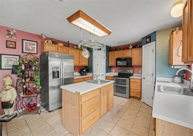 Photo 3 of Single family home for sale at 5888 Windridge Dr, Winter Haven, FL 33881 | MLS# TB8535328 | Listing updated on 2026-08-21