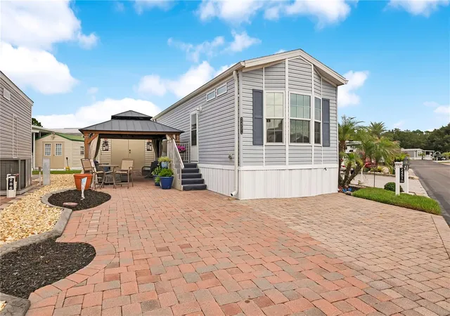 Photo 3 of Manufactured home for sale at 2451 Citrus Tree Rd, Clermont, FL 34714 | MLS# O6430248 | Listing updated on 2026-08-16