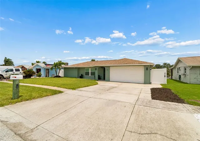 Photo 2 of Single family home for sale at 1166 Chancellor Dr, Holiday, FL 34690 | MLS# W7888226 | Listing updated on 2026-09-21