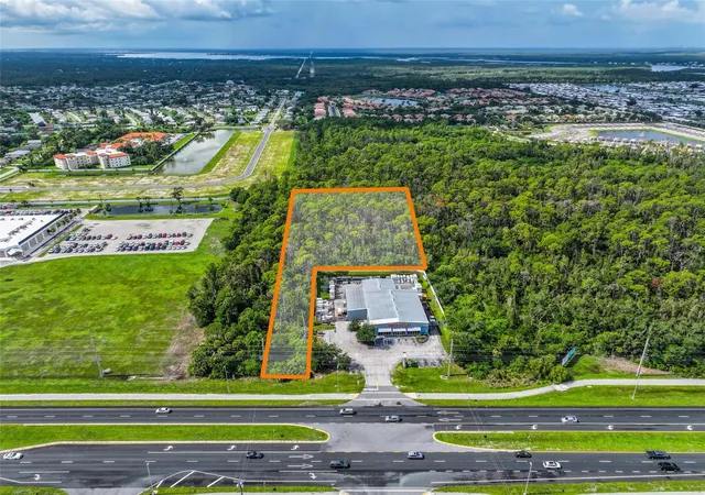 Photo 1 of Land for sale at 12986 Tamiami Trl S, North Port, FL 34287 | MLS# A4701939 | Listing updated on 2026-08-06