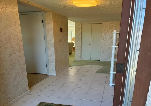 Photo 2 of Condo for sale at 7020 Cognac Dr #4, New Port Richey, FL 34653 | MLS# TB8535460 | Listing updated on 2026-08-28