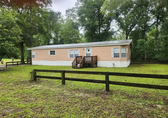 Photo 1 of Manufactured home for sale at 1182 Nw 27th Terrace, Bell, FL 32619 | MLS# GC542455 | Listing updated on 2026-08-24