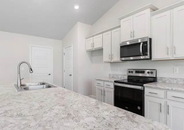 3rd image of 34 Rymshaw Dr, Palm Coast, FL 32164 | MLS# FC320415
