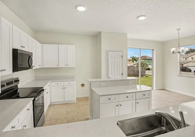 Photo 3 of Single family home for sale at 4542 Gallberry Ct, Orlando, FL 32818 | MLS# O6430531 | Listing updated on 2026-10-06