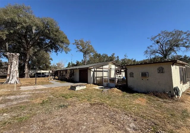 3rd image of 4404 Areca Palm Dr, Zephyrhills, FL 33541 | MLS# TB8535670
