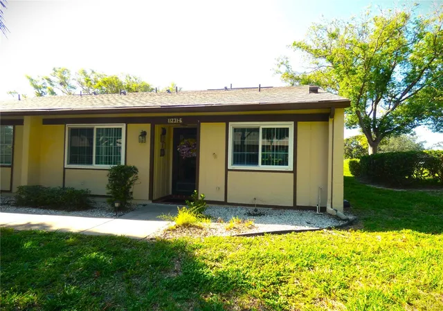 Photo 1 of Condo for sale at 11231 Dollar Lake Dr #6, PORT RICHEY, FL 34668 | MLS# W7888251 | Listing updated on 2026-10-07