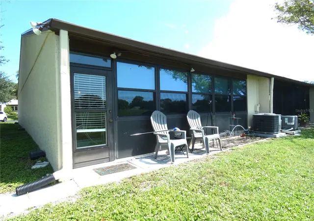 Photo 3 of Condo for sale at 11231 Dollar Lake Dr #6, Port Richey, FL 34668 | MLS# W7888251 | Listing updated on 2026-10-07