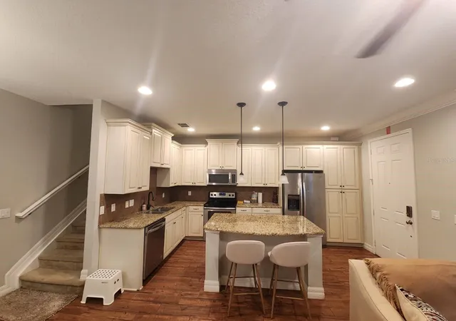 Photo 3 of Townhouse for sale at 10052 Eagle Crk Ctr Blvd, Orlando, FL 32832 | MLS# O6430711 | Listing updated on 2026-08-06