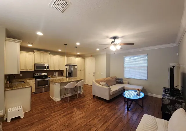 Photo 4 of Townhouse for sale at 10052 Eagle Crk Ctr Blvd, Orlando, FL 32832 | MLS# O6430711 | Listing updated on 2026-08-06
