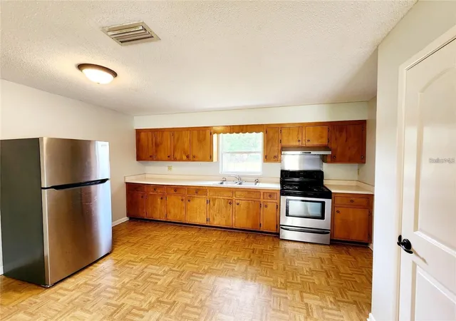 3rd image of 420 N Court St, Bronson, FL 32621 | MLS# GC542479