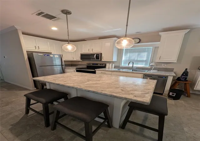 Photo 4 of Manufactured home for sale at 25364 NE 139th Loop, Fort Mc Coy, FL 32134 | MLS# OM729765 | Listing updated on 2026-08-10