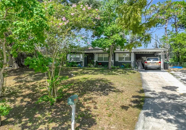 Photo 3 of Single family home for sale at 2002 Rockwell Rd, Orlando, FL 32808 | MLS# O6430820 | Listing updated on 2026-08-31