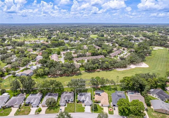 Photo 2 of Single family home for sale at 8018 Sugarbush Dr, Spring Hill, FL 34606 | MLS# W7888266 | Listing updated on 2026-09-23
