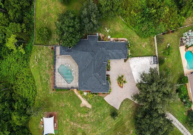 Photo 3 of Single family home for sale at 15532 Lake Grace Dr, Odessa, FL 33556 | MLS# TB8536000 | Listing updated on 2026-09-26