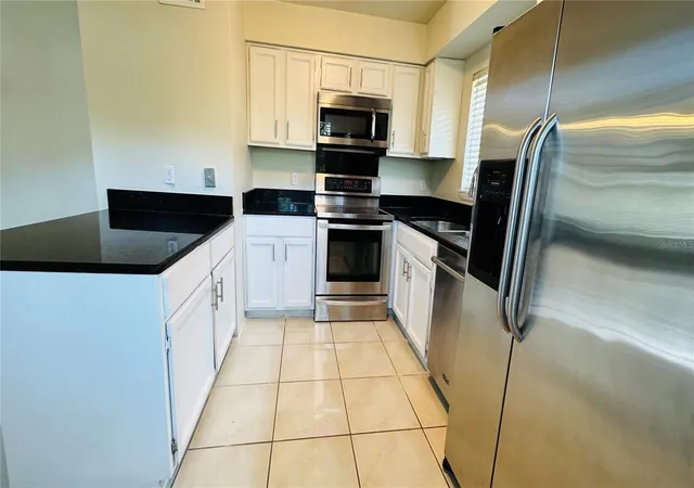 Listing Photo 5 - Condo for sale in building located at 4415 Pinebark Ave, Orlando, FL 32811 - Unit #48-4