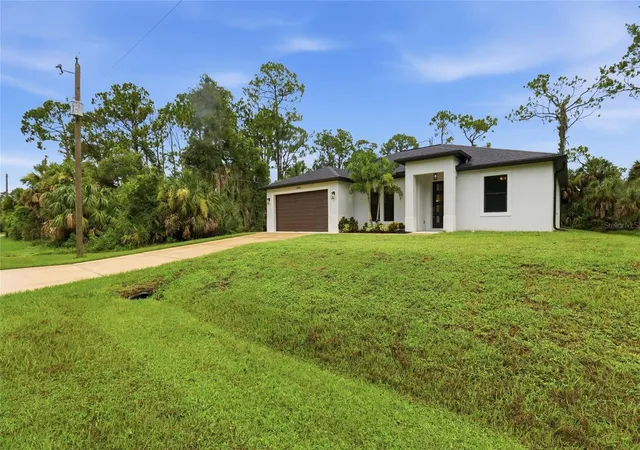 Photo 3 of Single family home for sale at 14390 Maddock Ave, Port Charlotte, FL 33953 | MLS# A4702101 | Listing updated on 2026-10-17