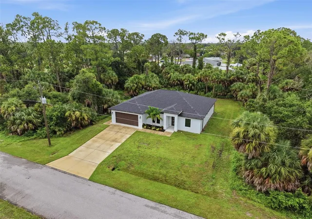 Photo 4 of Single family home for sale at 14390 Maddock Ave, Port Charlotte, FL 33953 | MLS# A4702101 | Listing updated on 2026-10-17