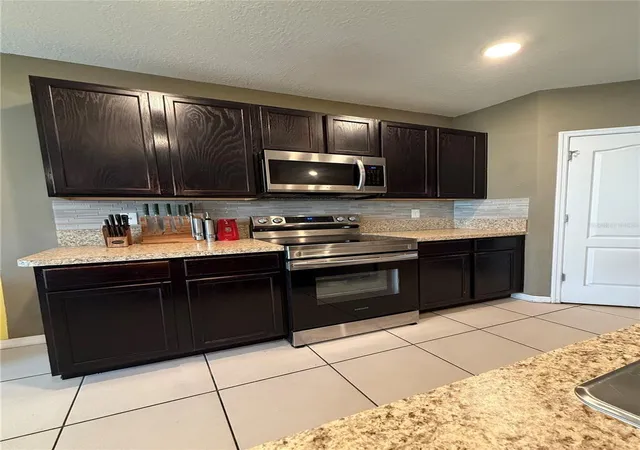 Photo 3 of Single family home for sale at 1876 Cassidy Knoll Dr, Kindred, FL 34744 | MLS# S5155050 | Listing updated on 2026-09-04