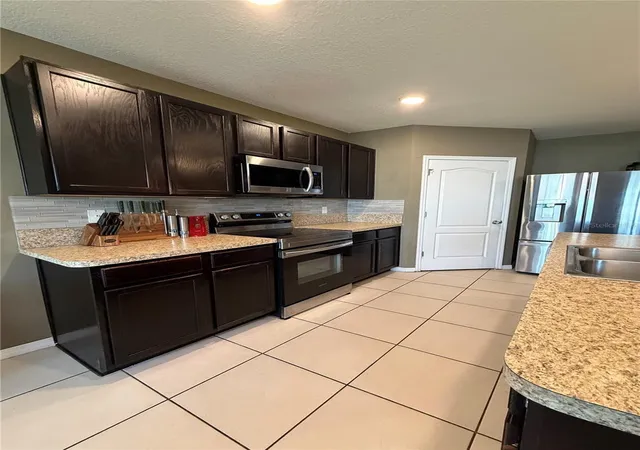 Photo 4 of Single family home for sale at 1876 Cassidy Knoll Dr, Kindred, FL 34744 | MLS# S5155050 | Listing updated on 2026-09-04