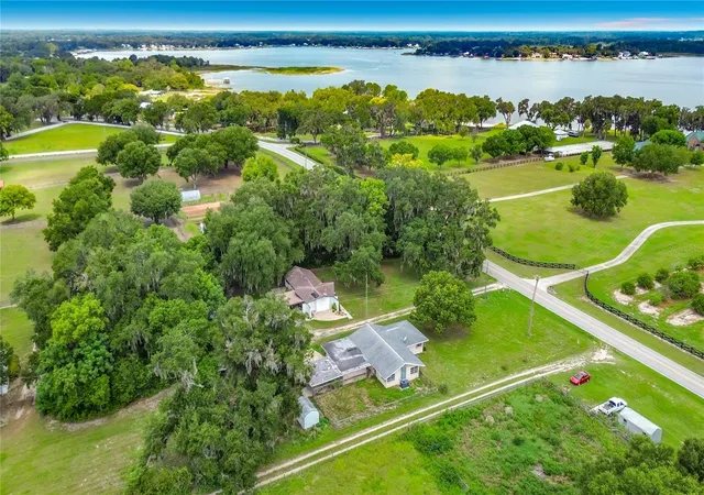 Photo 1 of Single family home for sale at 11900 Se Sunset Harbor Rd, Weirsdale, FL 32195 | MLS# OM729787 | Listing updated on 2026-08-27