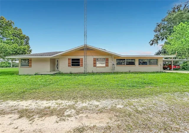 Photo 2 of Single family home for sale at 11900 Se Sunset Harbor Rd, Weirsdale, FL 32195 | MLS# OM729787 | Listing updated on 2026-09-26
