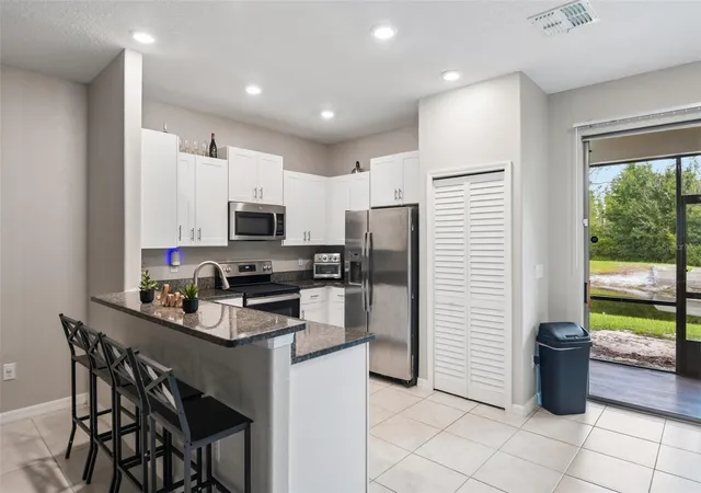 Photo 3 of Townhouse for sale at 11705 Castine St, New Port Richey, FL 34654 | MLS# TB8536072 | Listing updated on 2026-10-04