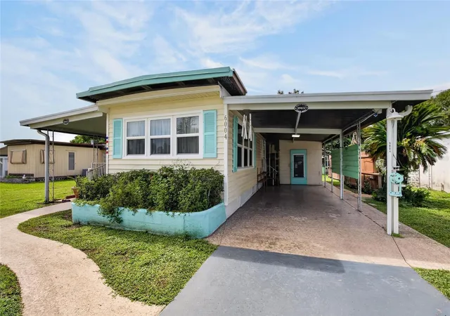 Photo 3 of Manufactured home for sale at 6004 Alpine Dr, Zephyrhills, FL 33542 | MLS# TB8536164 | Listing updated on 2026-09-24