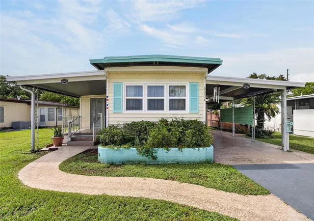 Photo 2 of Manufactured home for sale at 6004 Alpine Dr, Zephyrhills, FL 33542 | MLS# TB8536164 | Listing updated on 2026-09-24