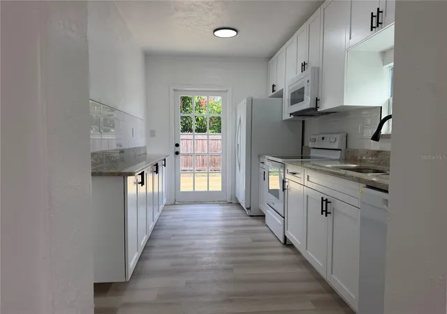 3rd image of 1102 E 108Th Ave, Tampa, FL 33612 | MLS# TB8536176