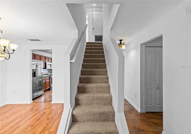 Photo 3 of Single family home for sale at 8830 Isla Bella Dr, Orlando, FL 32818 | MLS# O6431038 | Listing updated on 2026-10-24