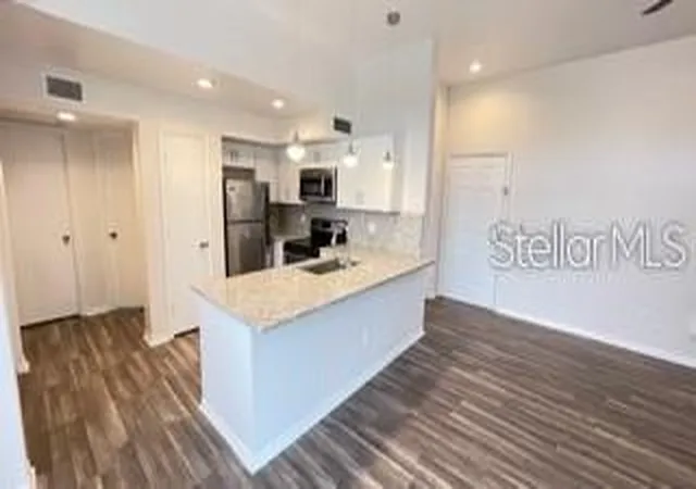 image of 7270 Westpointe Blvd #933, Orlando, FL 32835 | MLS# O6431046