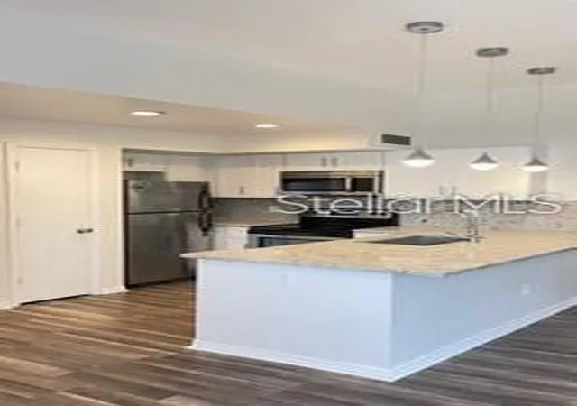image of 7270 Westpointe Blvd #933, Orlando, FL 32835 | MLS# O6431046