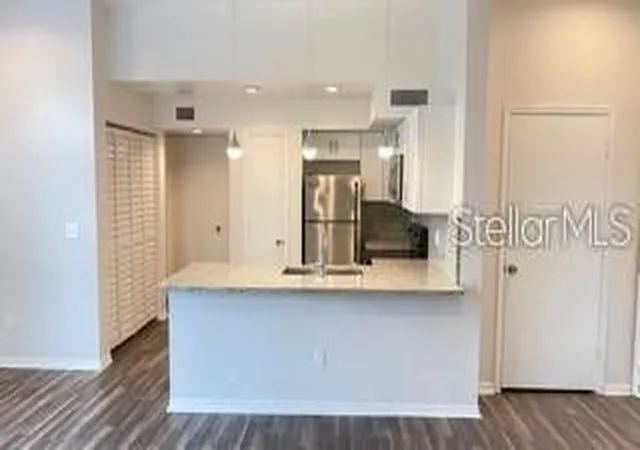 image of 7270 Westpointe Blvd #933, Orlando, FL 32835 | MLS# O6431046