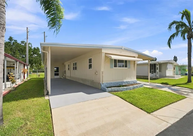 Photo 2 of Manufactured home for sale at 6711 Clemens Blvd, Port Richey, FL 34668 | MLS# TB8536232 | Listing updated on 2026-08-30