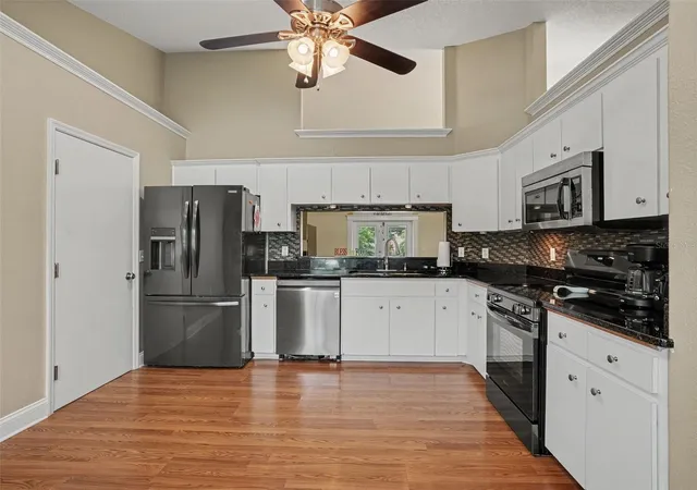 Photo 4 of Single family home for sale at 128 Brighton Cir, Auburndale, FL 33823 | MLS# TB8536254 | Listing updated on 2026-10-03