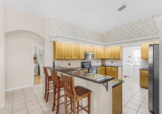 Photo 4 of Single family home for sale at 23270 Hainlin Ave, Punta Gorda, FL 33980 | MLS# A4702176 | Listing updated on 2026-10-21