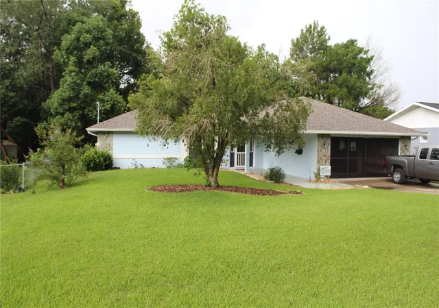 Photo 3 of Single family home for sale at 21110 Sw Plantation St, Dunnellon, FL 34431 | MLS# OM729850 | Listing updated on 2026-08-08